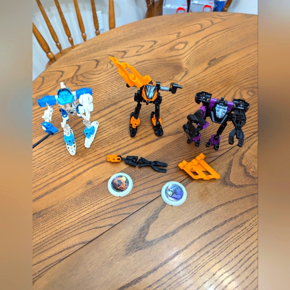 Lego Technic throw bots.  Y2K. 3 total. All parts may not be there. 3 Discs